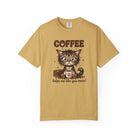 Mustard yellow unisex cotton t-shirt featuring a cute kitten holding a coffee mug graphic.