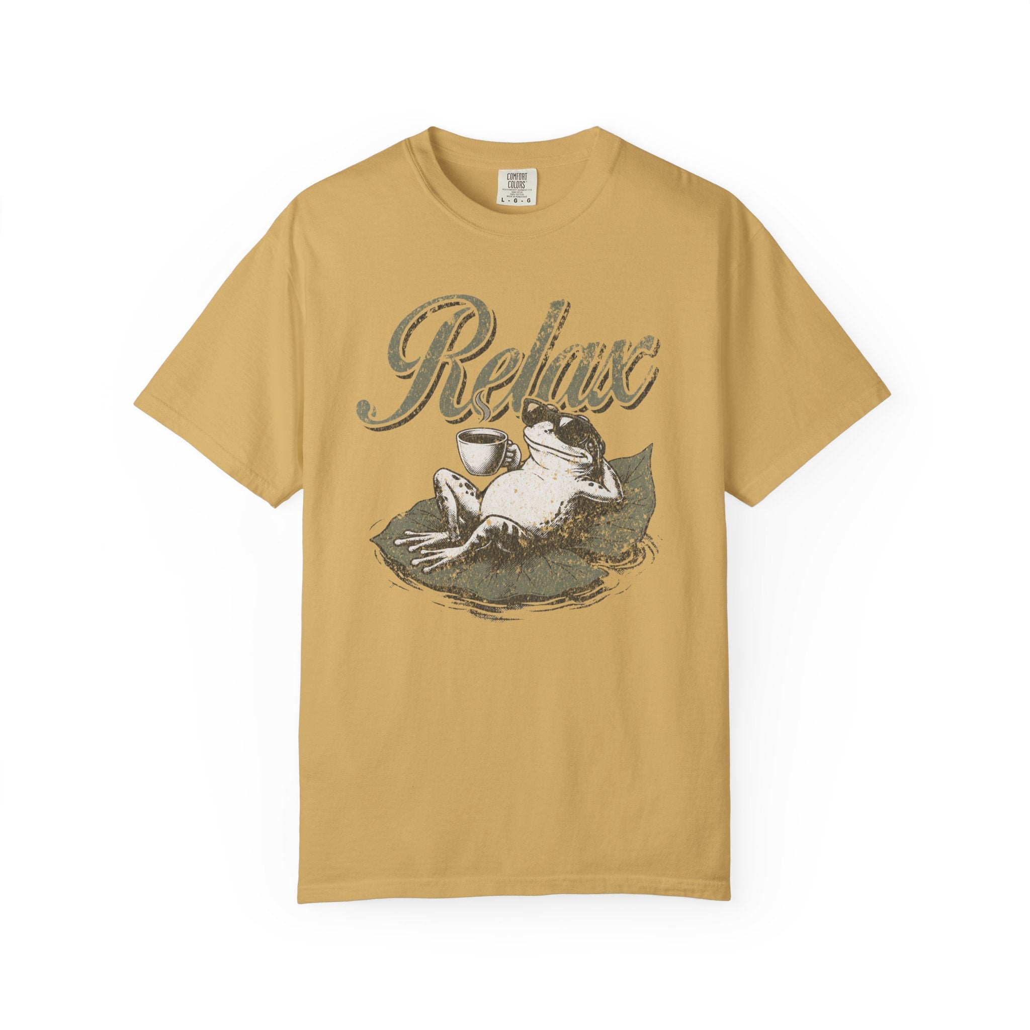 Mustard yellow unisex t-shirt featuring a distressed graphic of a frog relaxing on a lily pad.