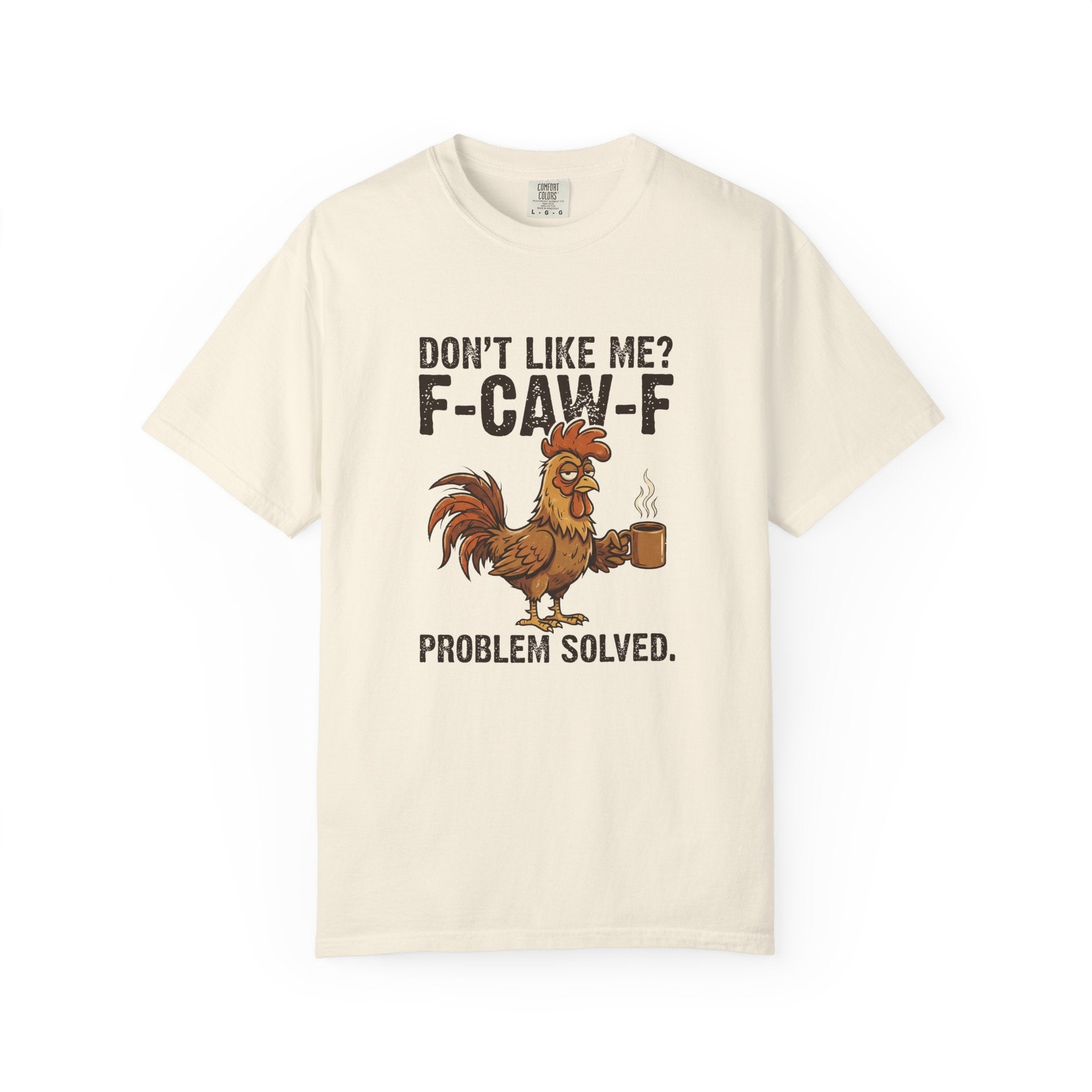 A cream-colored t-shirt featuring a distressed graphic of a rooster holding a coffee mug.