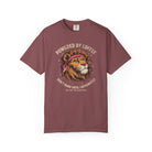 Maroon t-shirt featuring a graphic of a lion wearing a bandana with the text Powered by Coffee.