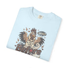 Light blue unisex t-shirt featuring a distressed graphic of a rooster saying COFFEE.