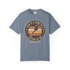 Blue t-shirt with a distressed graphic of a coffee bean shaped like a sperm cell.