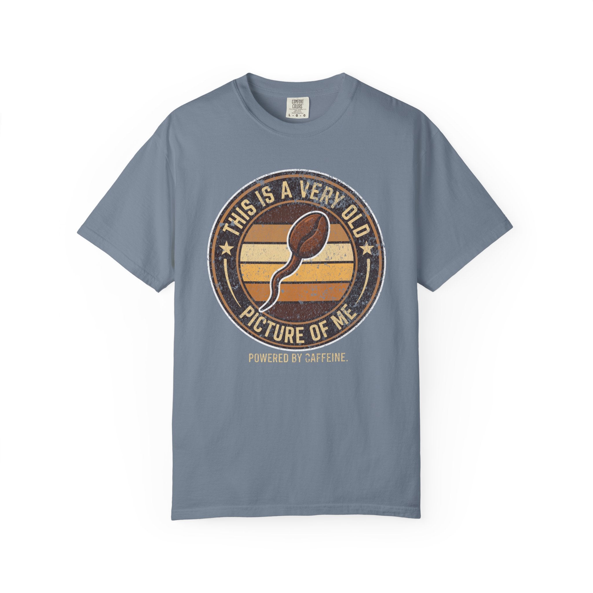 Blue t-shirt with a distressed graphic of a coffee bean shaped like a sperm cell.