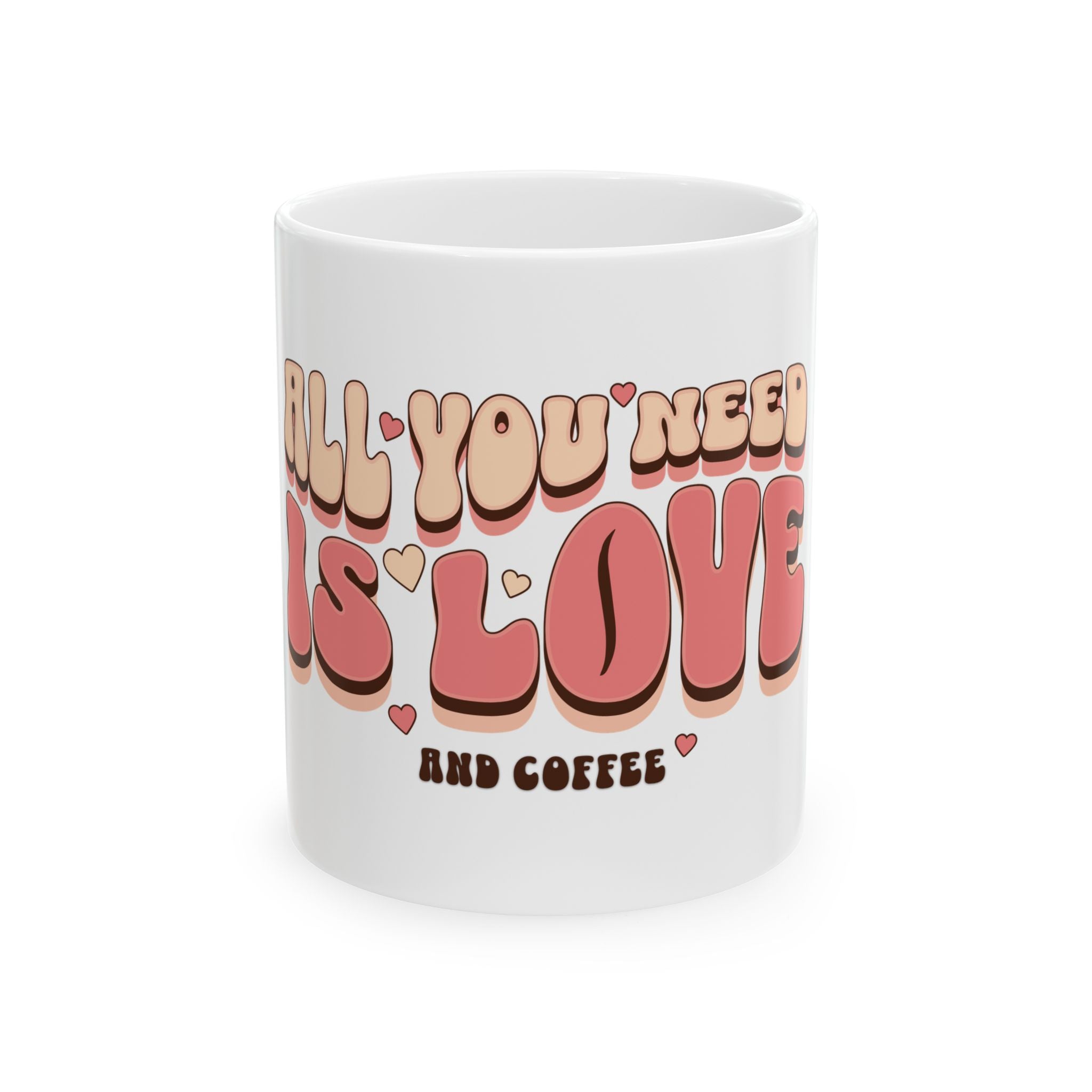 A white ceramic mug featuring retro bubble lettering that reads All You Need Is Love And Coffee.