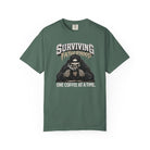 Green Comfort Colors unisex t-shirt with a skeleton graphic drinking coffee and text.