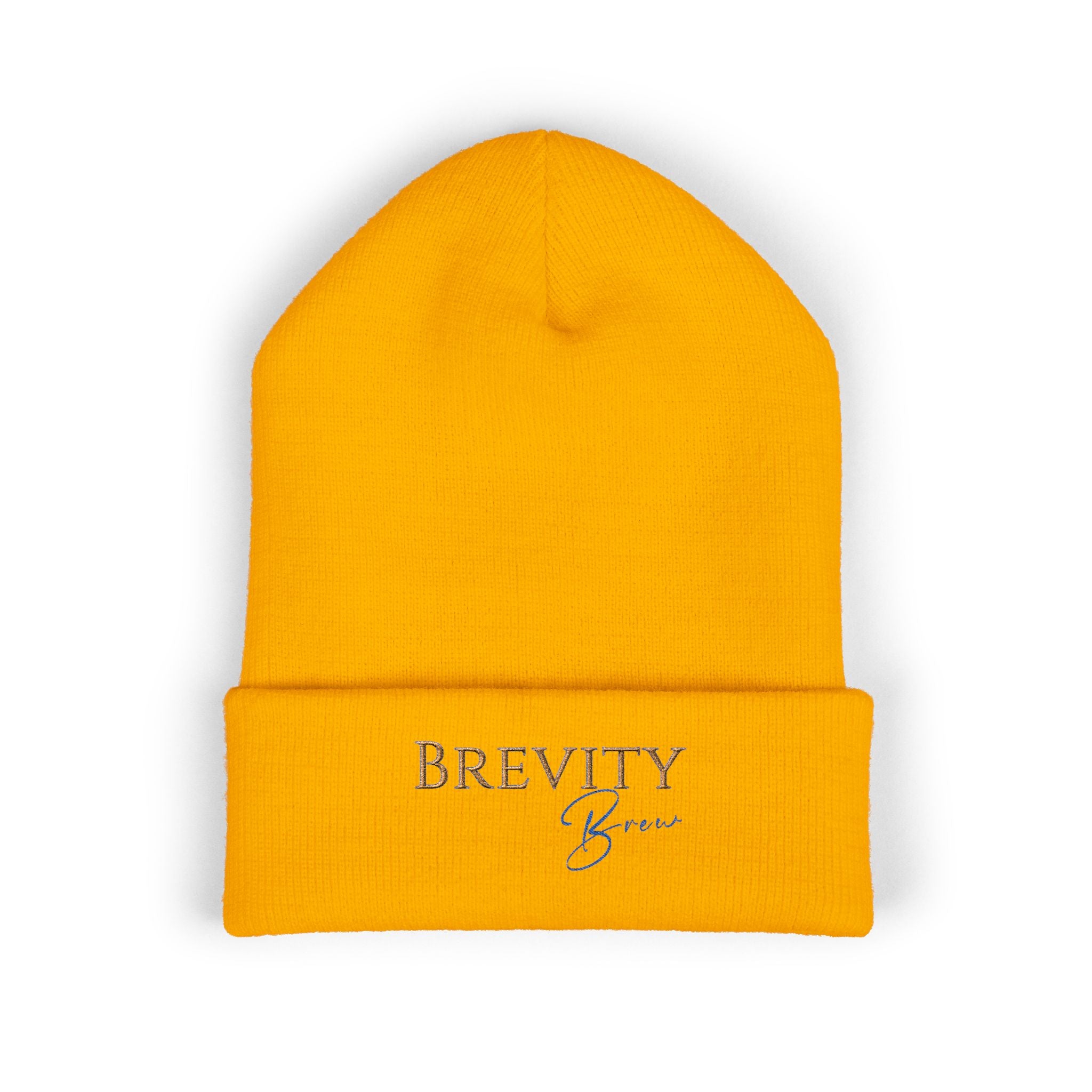 A yellow cuffed beanie with "Brevity Brew" embroidered on the front.