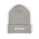 Gray cuffed knit beanie with embroidered "COFFEE" text.