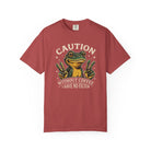 Red t-shirt featuring a graphic of a frog making peace signs with the text Caution No Filter.