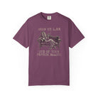 Purple Comfort Colors 1717 t-shirt with a coffee bean character lounging on a sofa graphic.