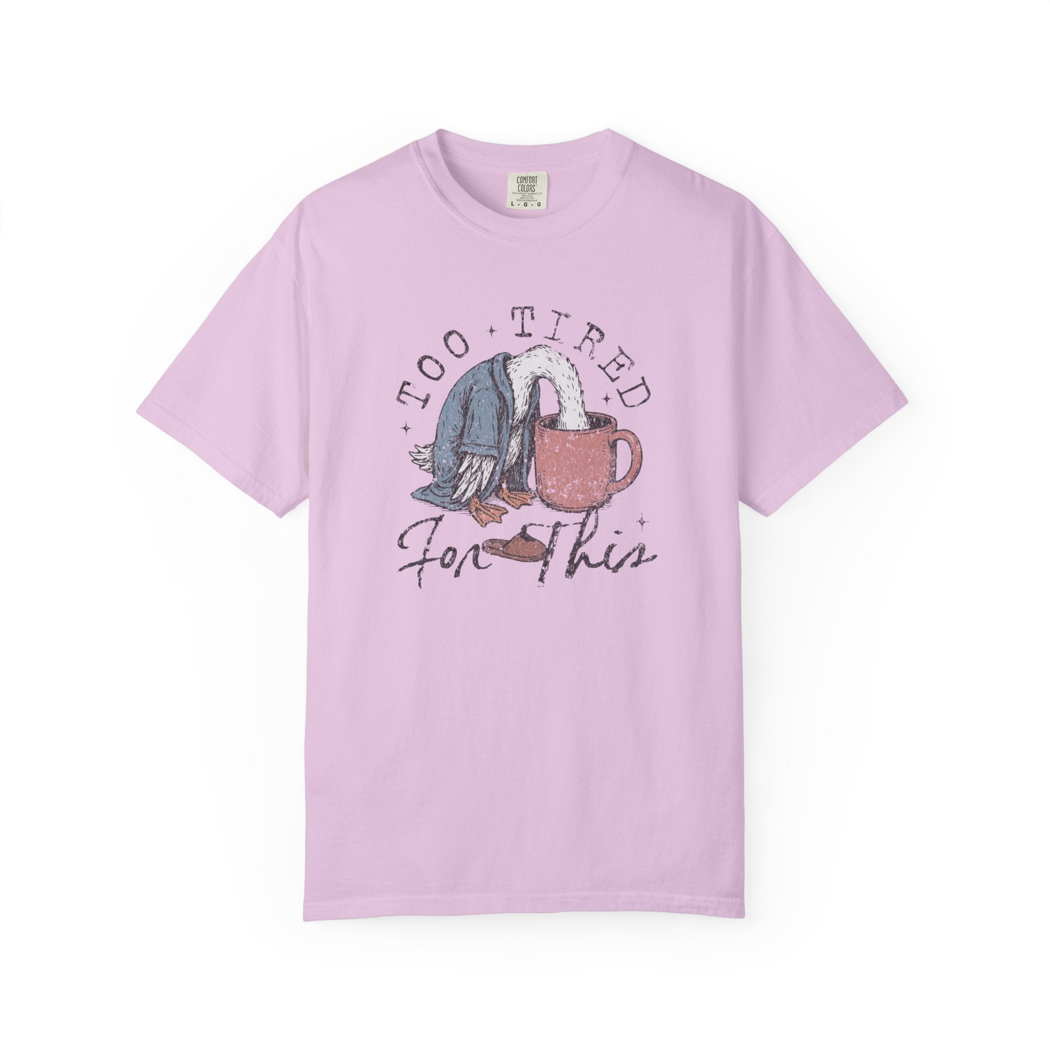 Light purple unisex t-shirt with a graphic of a bird in a robe with its head in a coffee mug.