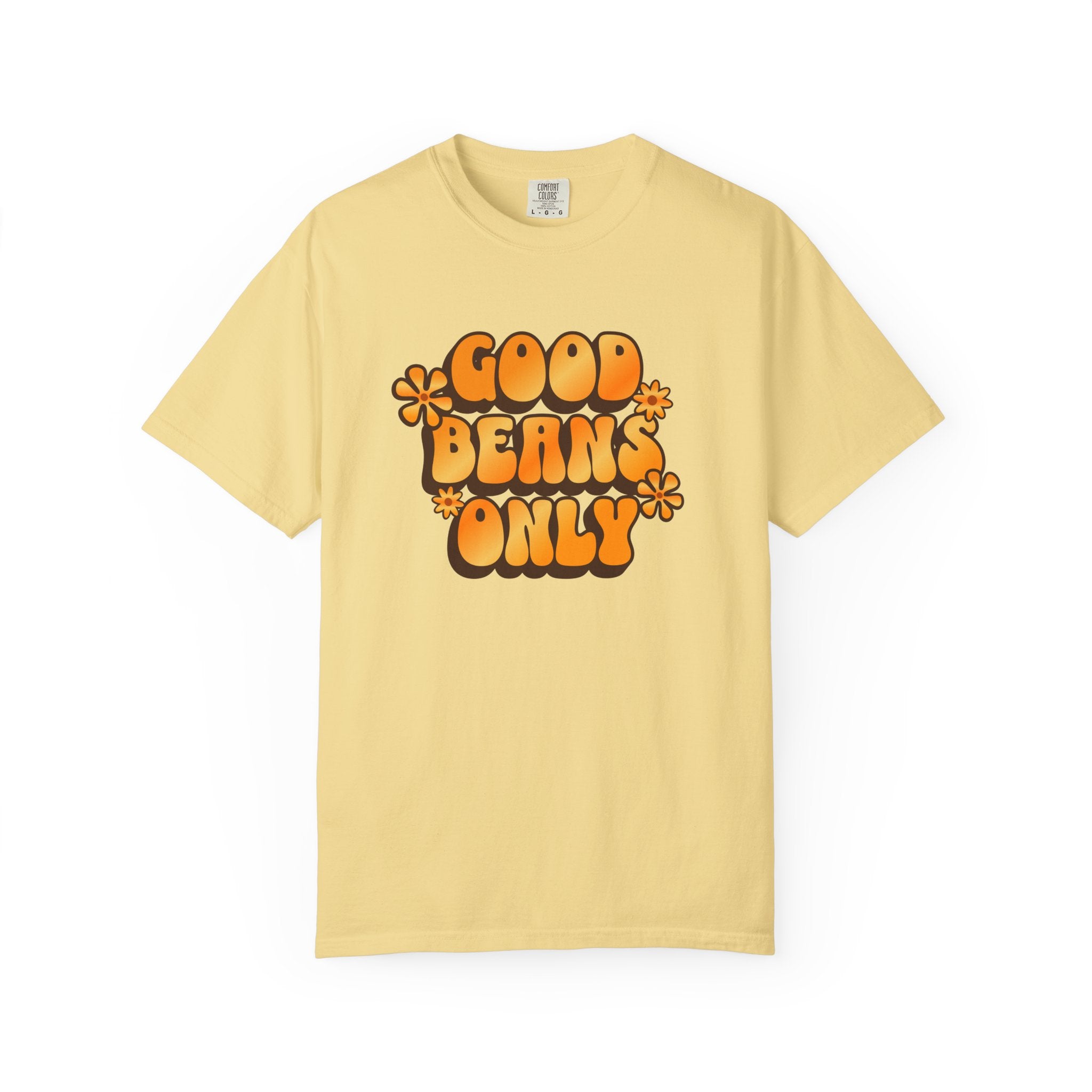 A light yellow cotton t-shirt featuring the text Good Beans Only in a retro orange font.