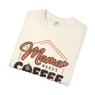 Folded Ivory Mama Needs Coffee T-shirt.