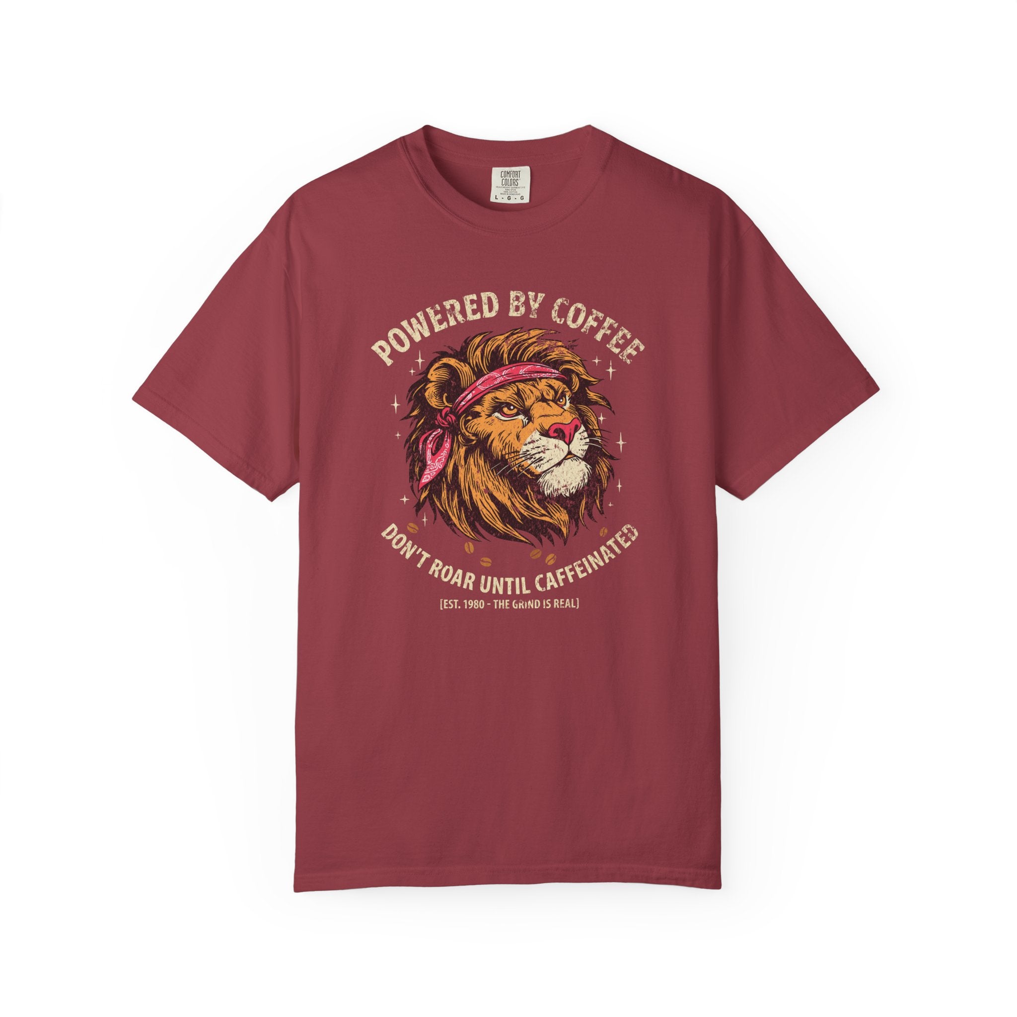 Maroon t-shirt featuring a graphic of a lion wearing a bandana with the text Powered by Coffee.