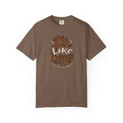 A brown short-sleeved t-shirt featuring a distressed graphic that says Be Like Coffee.
