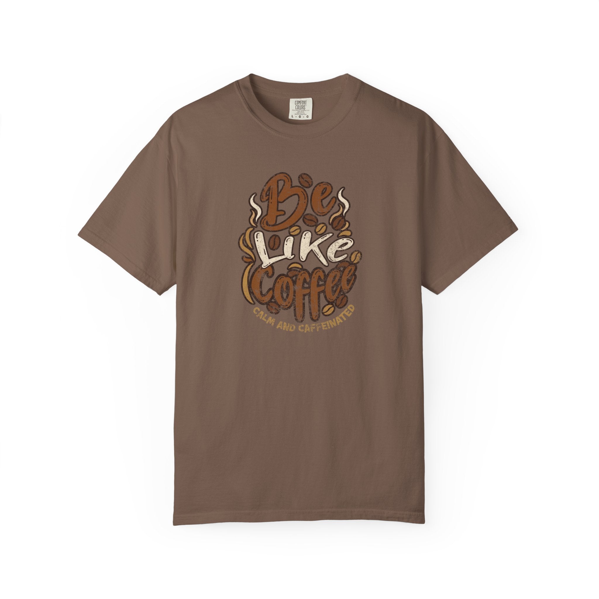 A brown short-sleeved t-shirt featuring a distressed graphic that says Be Like Coffee.
