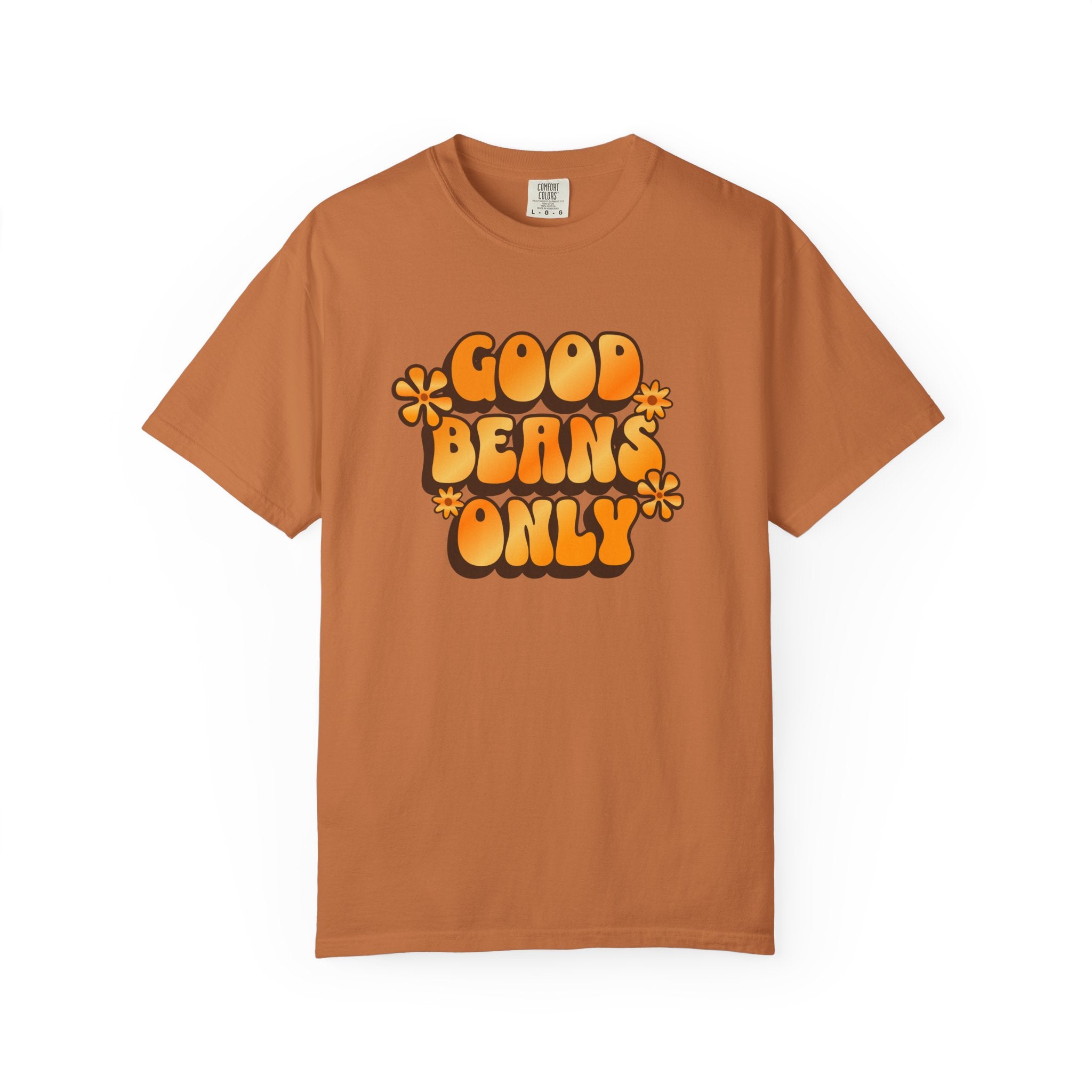 A rust-colored cotton t-shirt featuring the text Good Beans Only in a retro orange font with flowers.
