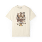 Cream-colored unisex t-shirt featuring a distressed graphic of a rooster drinking coffee.