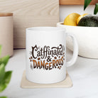 White ceramic coffee mug with Catffinated & Dangerous text and cat-themed graphics.