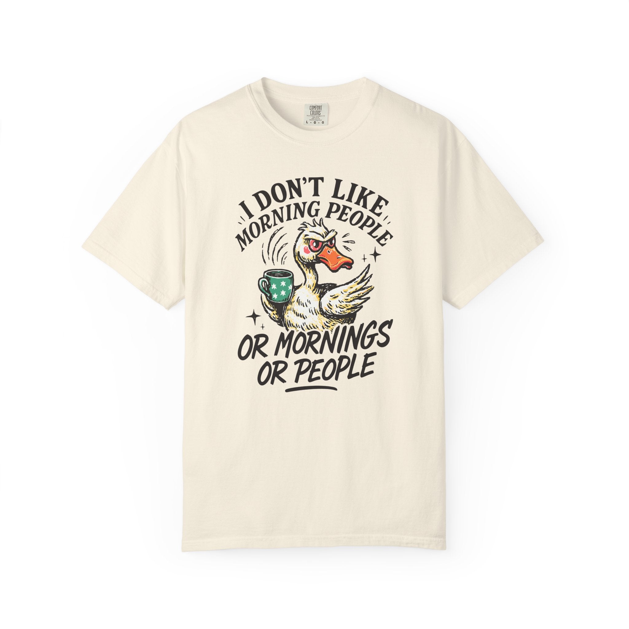 Cream-colored t-shirt with a graphic of an angry duck holding a coffee mug.