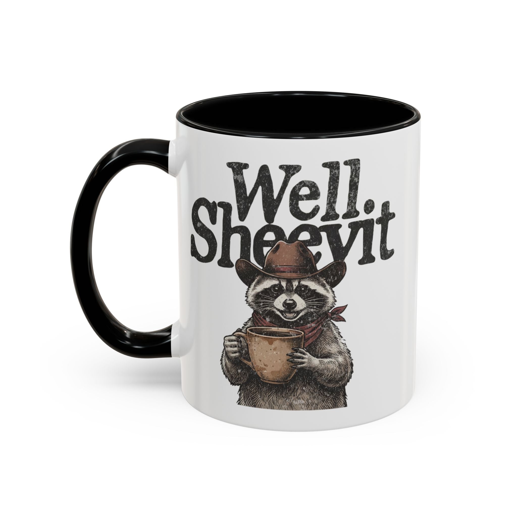White ceramic mug with a black handle and rim, featuring a raccoon in a cowboy hat holding a mug.