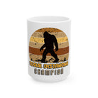 White coffee mug featuring a retro Bigfoot silhouette with the text Social Distancing Champion.