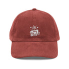 Red corduroy baseball cap with an embroidered white coffee cup and heart logo on the front.