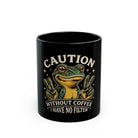 Black ceramic mug featuring a frog graphic with the text Caution Without Coffee I Have No Filter.