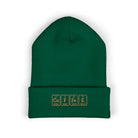 A green cuffed beanie with "COFFEE" embroidered in periodic table style.