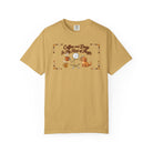 Mustard yellow t-shirt featuring a stick figure with a coffee mug and a dog.