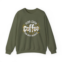 An olive green crewneck sweatshirt featuring a white and yellow coffee-themed graphic design.