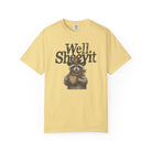 Light yellow t-shirt featuring a distressed graphic of a raccoon wearing a cowboy hat and scarf.