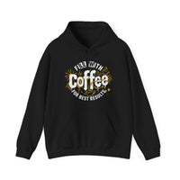 A black hooded sweatshirt featuring a white and gold graphic that says Fill With Coffee For Best Results.