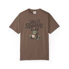 Brown unisex t-shirt featuring a graphic of a cowboy frog holding a coffee mug with text above.
