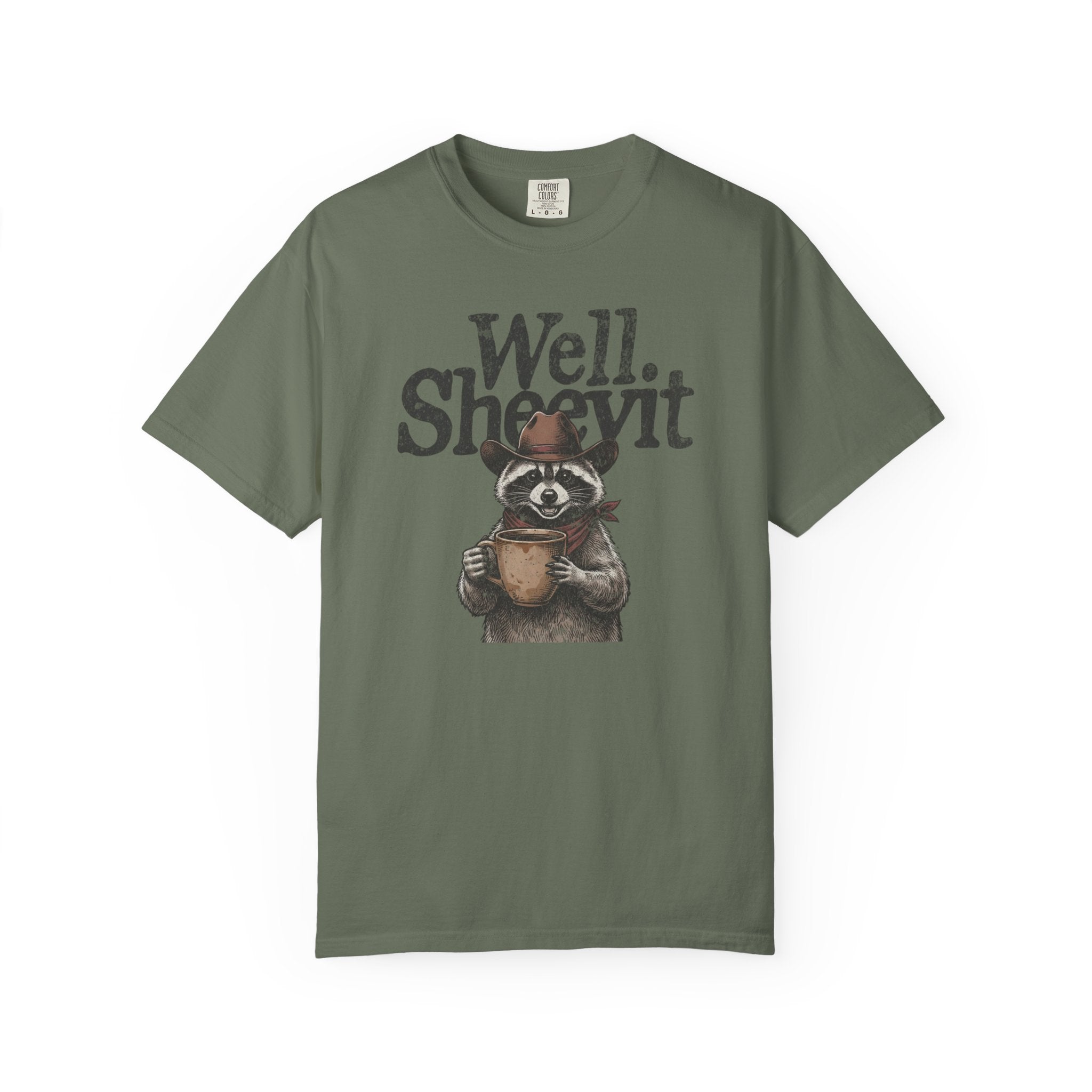 Olive green t-shirt featuring a graphic of a raccoon in a cowboy hat holding a coffee mug.