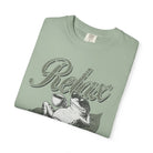 Sage green unisex t-shirt featuring a distressed graphic of a frog wearing sunglasses with coffee.
