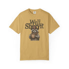 Mustard yellow t-shirt featuring a raccoon in a cowboy hat holding a coffee mug with text above.