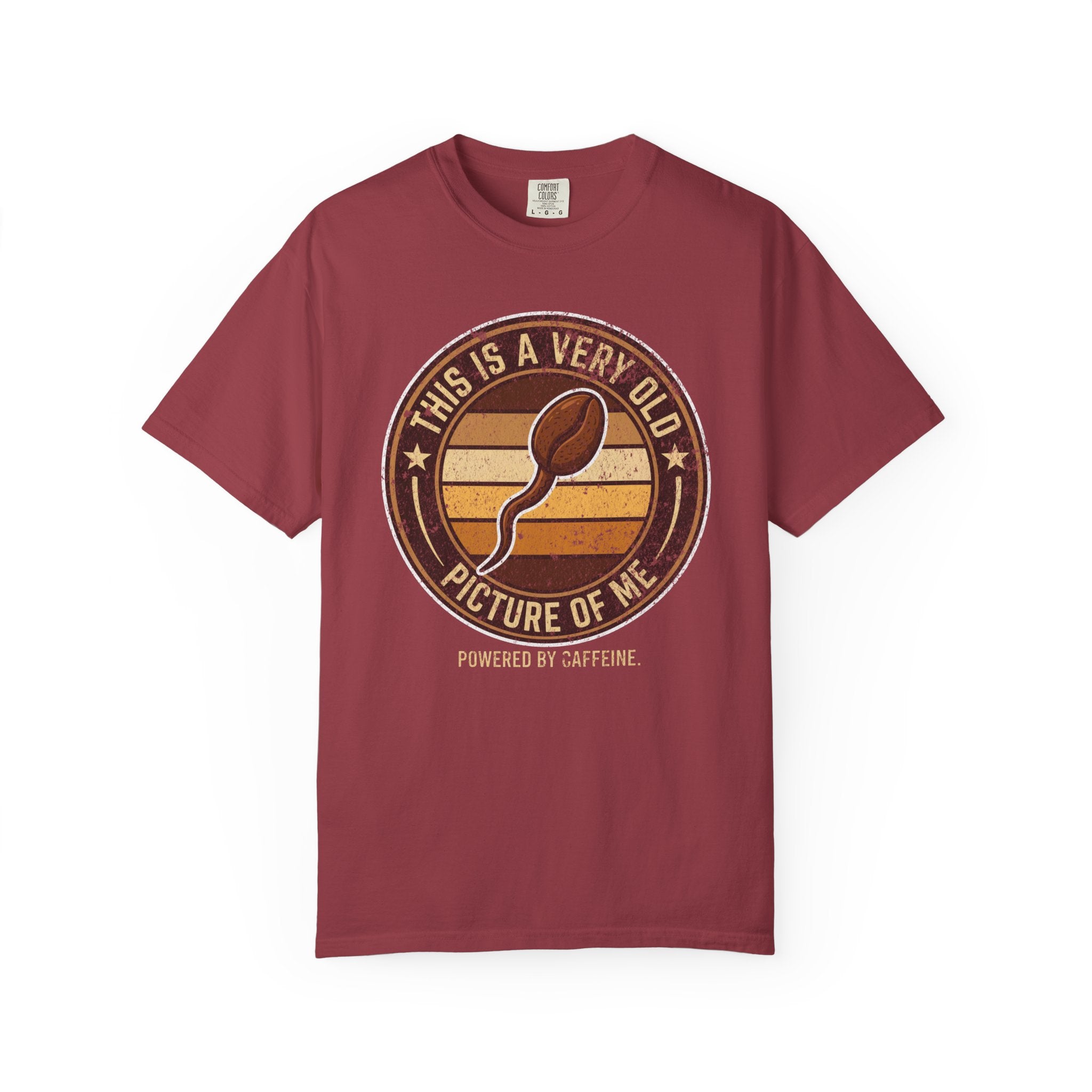 Maroon t-shirt with a vintage-style graphic of a coffee bean shaped like a sperm cell.