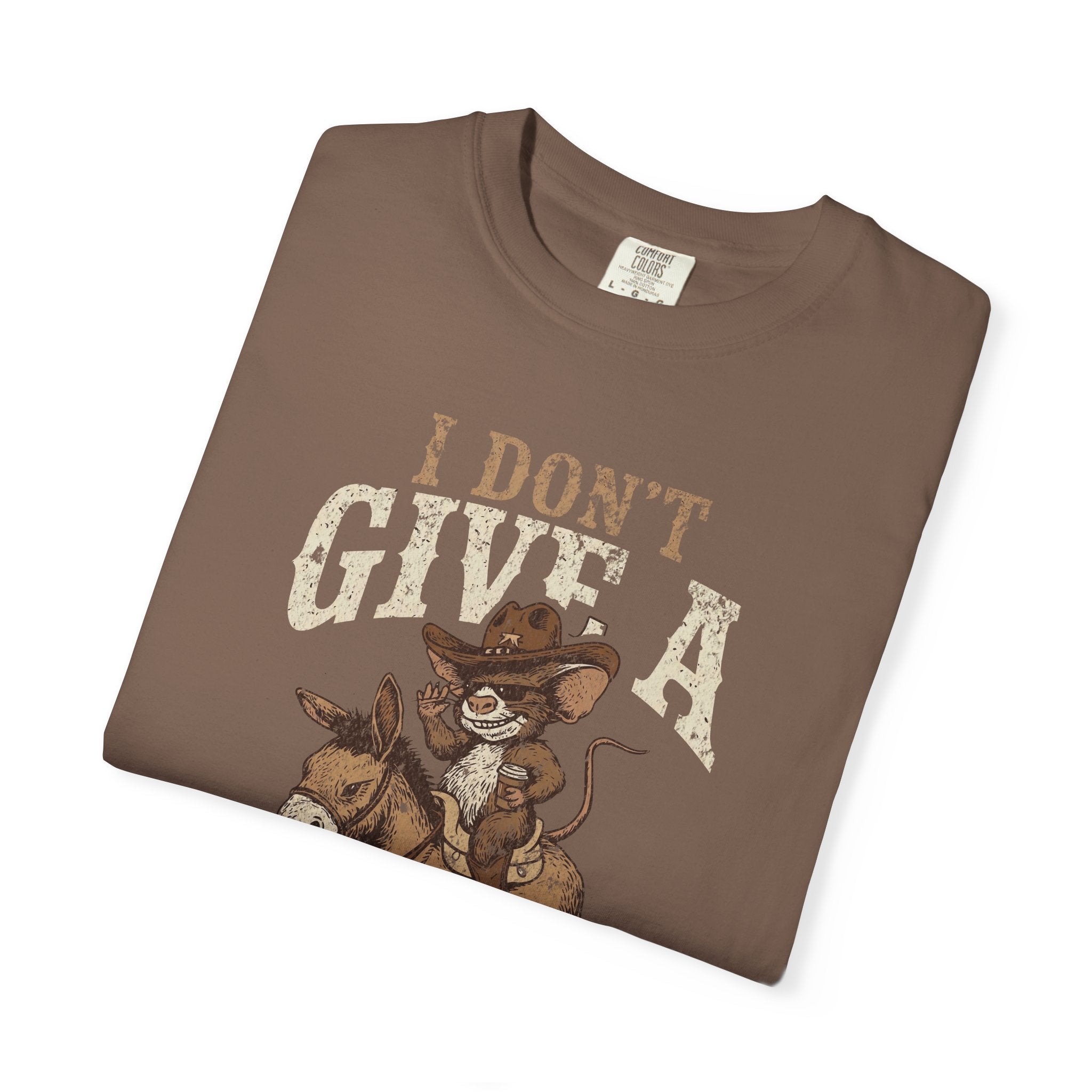 Brown t-shirt featuring a graphic of a mouse in a cowboy hat riding a donkey with text.