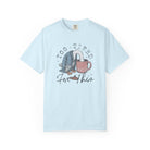 Light blue t-shirt with a graphic of a bird with its head in a coffee mug and text Too Tired For This
