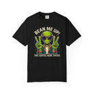 Black t-shirt with a graphic of a green alien wearing sunglasses and making peace signs.