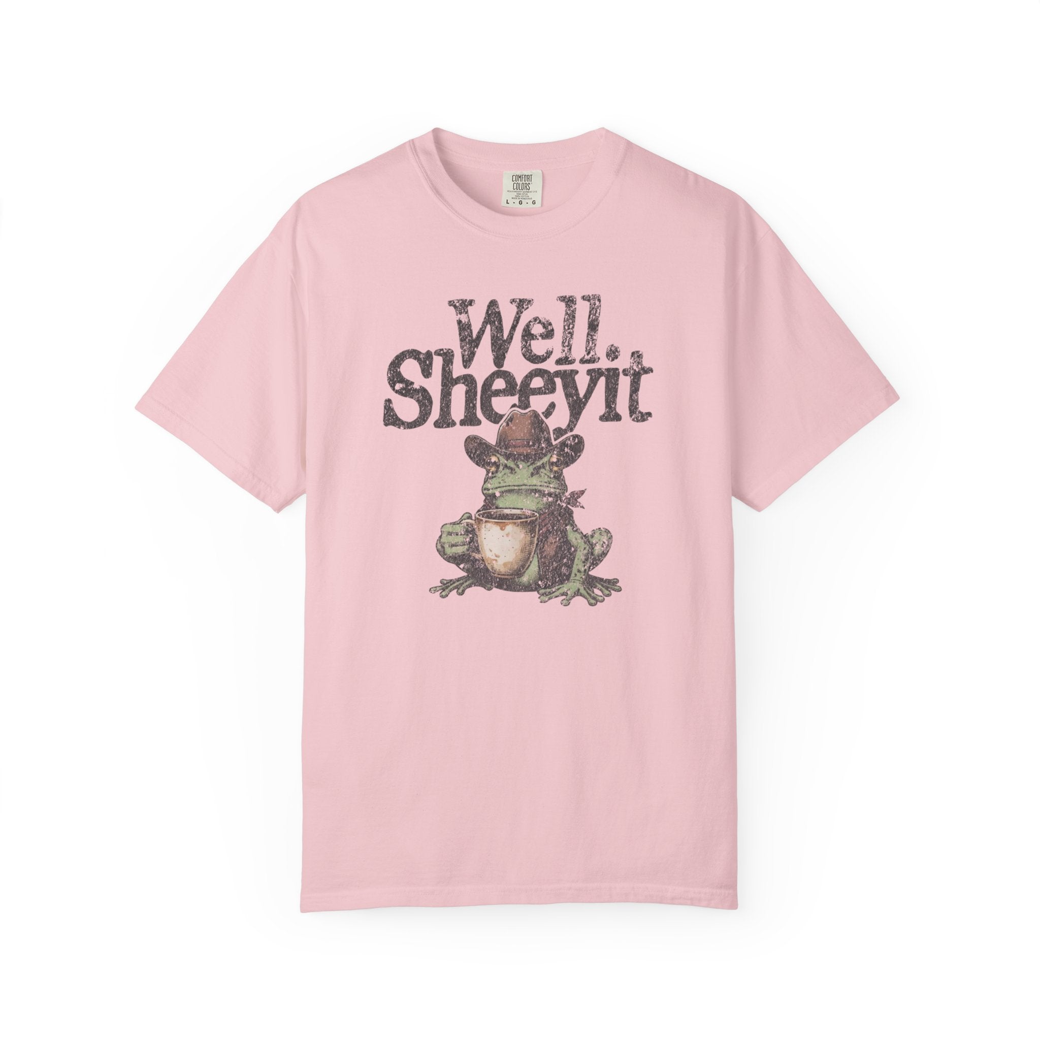 Light pink t-shirt featuring a distressed graphic of a cowboy frog holding a coffee mug.