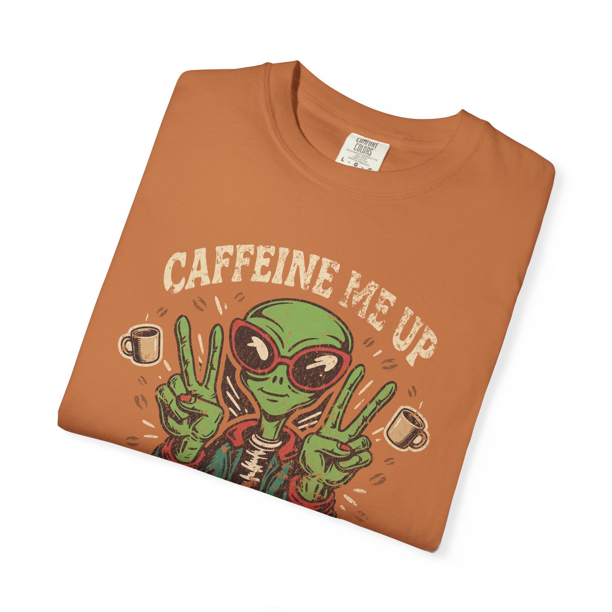 Orange unisex t-shirt with a distressed graphic of an alien wearing sunglasses and making peace signs