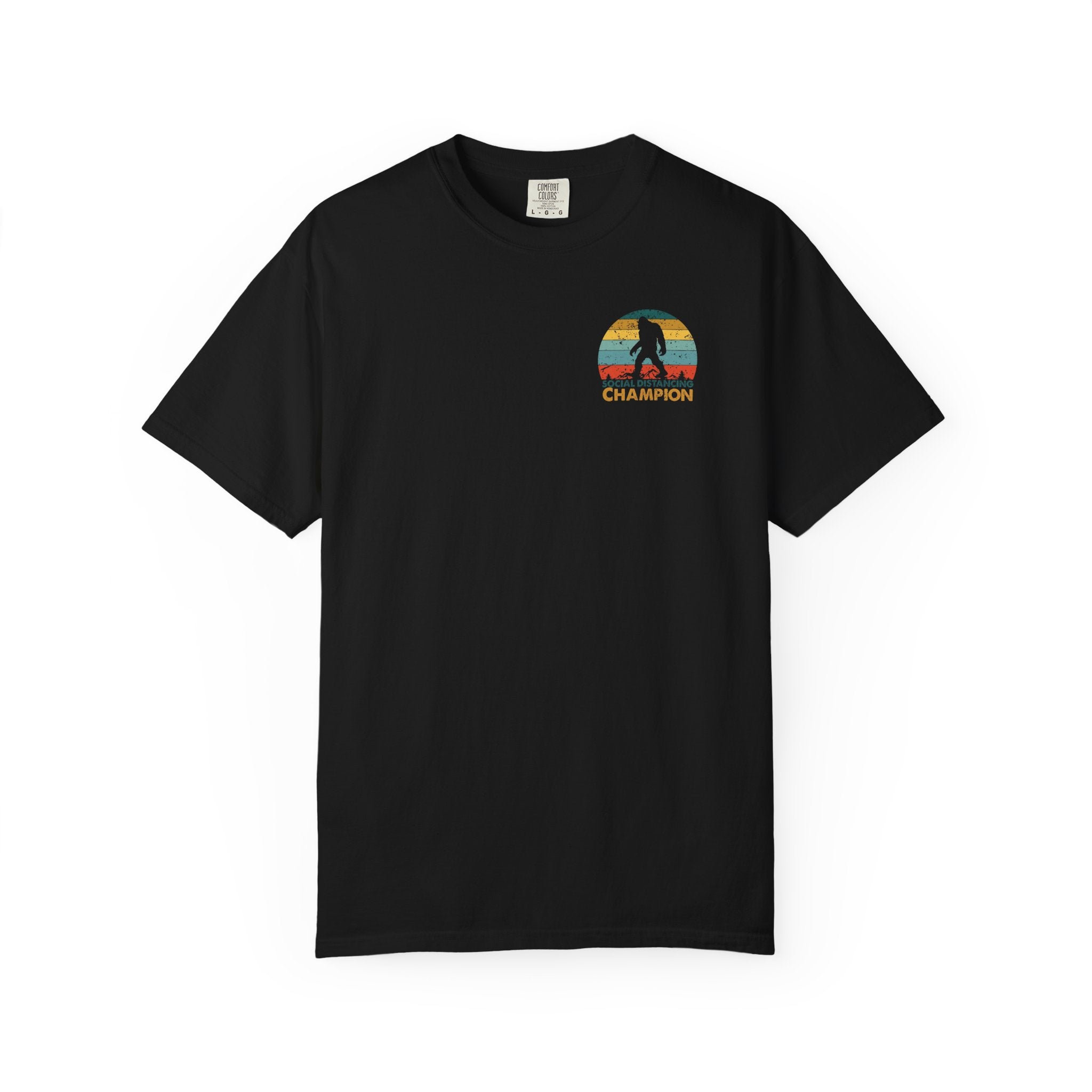Black t-shirt with a small retro Bigfoot graphic and the text Social Distancing Champion.