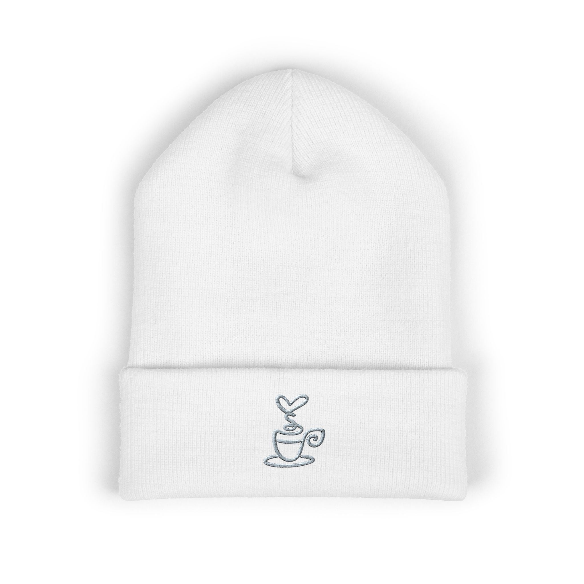 Embroidered coffee cup cuffed beanie in white.